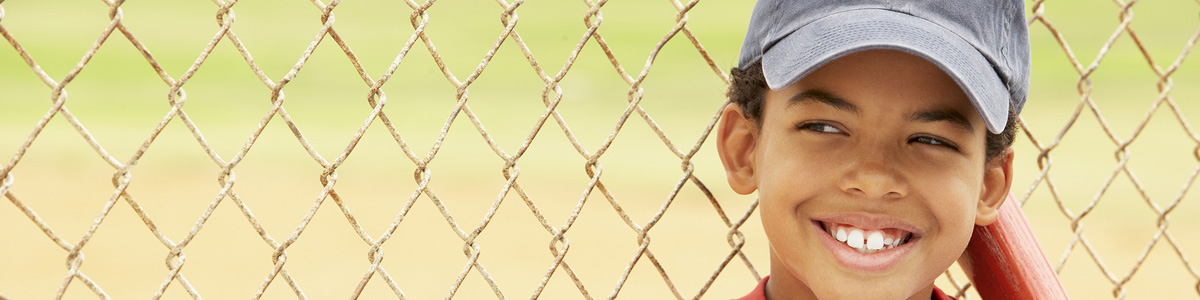 Youth player holding a baseball bat